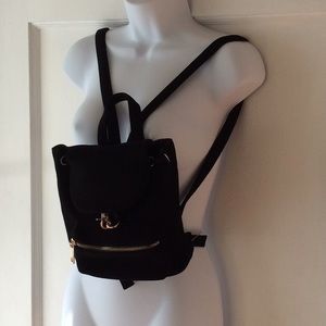 Small black velvet backpack